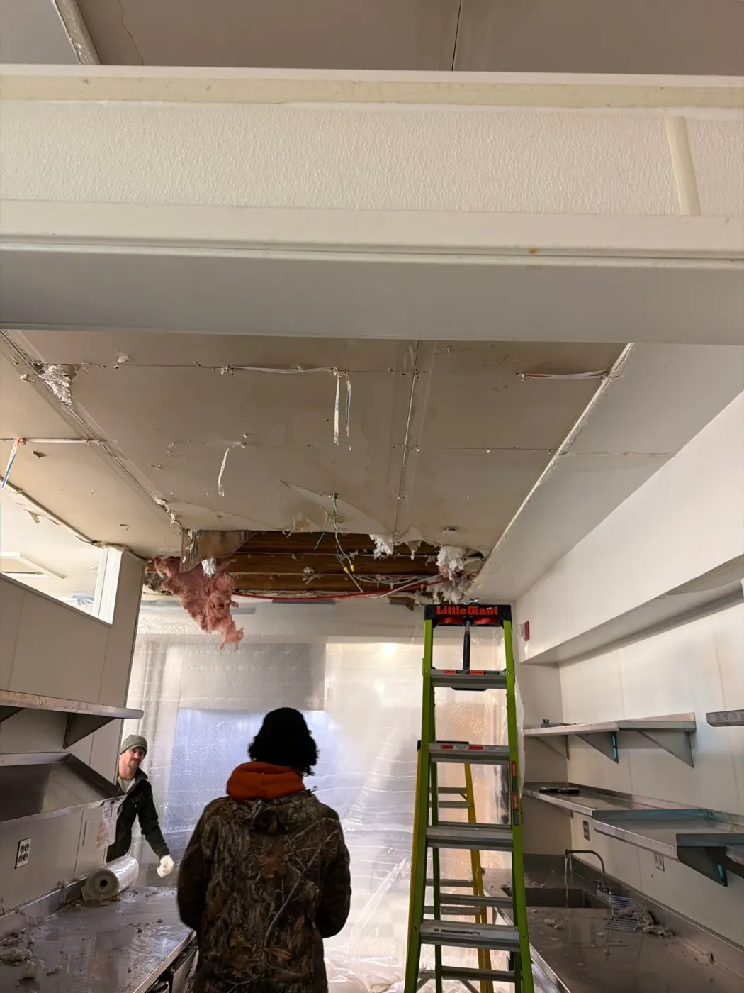 Moisture meter reading on drywall in Williams Creek water loss